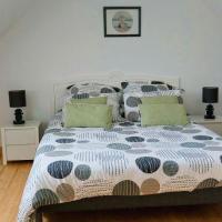 La chambre du gîte Triskell avec son lit de 160